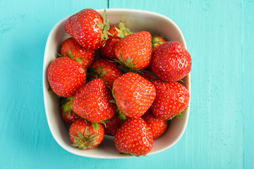 Strawberry Bowl On Blue Background