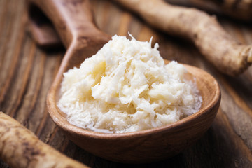 Seasoning of grated horseradish, closeup