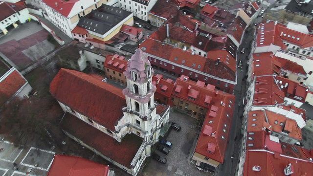 AERIAL. Smooth flight around beautiful abandoned Blessed Virgin Mary of Consolation church in Vilnius old town, Lithuania