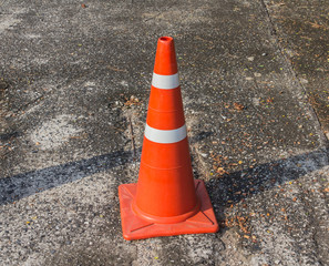 Background with traffic cone on road track