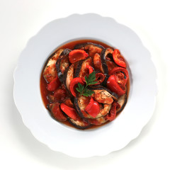 Baked aubergines with tomatoes and peppers 