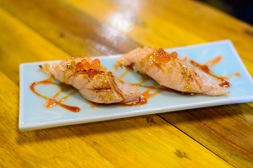 Fototapeta na wymiar Fresh japanese salmon sushi