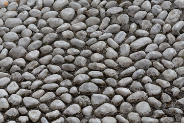 Floor walkway made of small pebbles