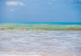 Waves on the sandy beach