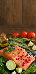 Salmon with vegetables, olive oil and herbs