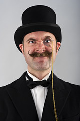Charicature portrait of man in top hat and monocle