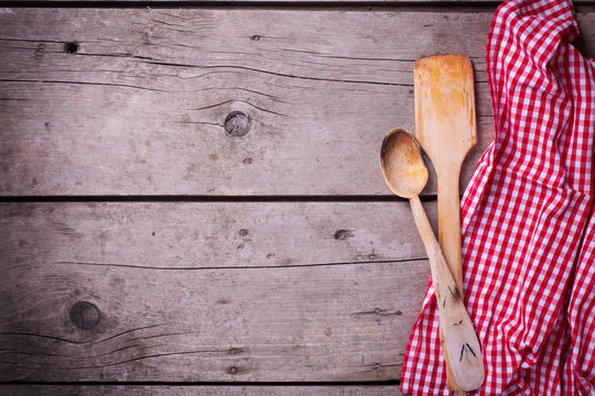 Red checkered  kitchen towel and kitchen tools