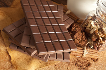 Chocolate bars, nuts, cinnamon, cocoa and milk