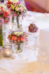 Elegant table set in soft pink for wedding 