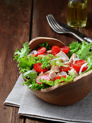 Salad with chicken, tomato cherry and onion
