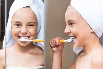 Little girl brushing her teeth