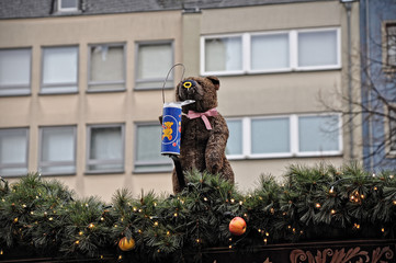 Christmas decoration figurines at winter market in Cologne, Germany