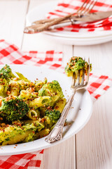 Broccoli pasta with sauce of green peas.