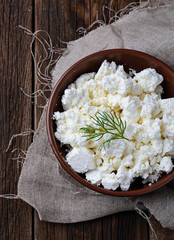 Cottage cheese in brown bowl
