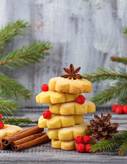 Sweet shortbread cookies in form of Christmas tree