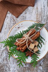 Cinnamon sticks in white plate