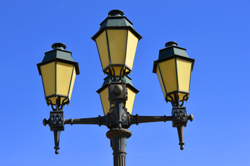 Fototapeta na wymiar Street lights in Faro old town Portugal