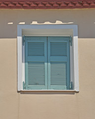 Athens Greece, green shutters window in Plaka old neighborhood