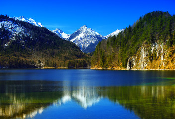 Fototapeta na wymiar Hohenschwangau lake with bavarian alps in Germany