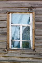 Carved window in old National russian wooden  house