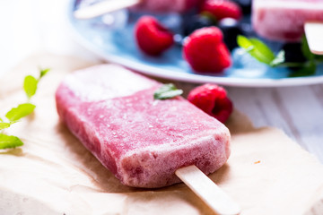 Refreshing popsicle with berry fruits