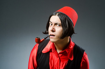 Man wearing red fez hat