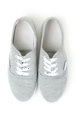 Pair of grey shoes isolated on white