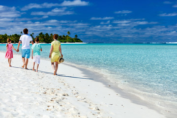 Family on a tropical beach vacation