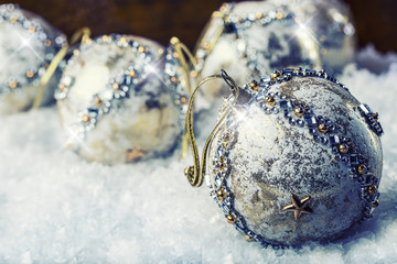 Christmas time. Luxury Christmas ball in the snow and snowy abstract scenes