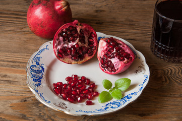pomegranate on the wooden background