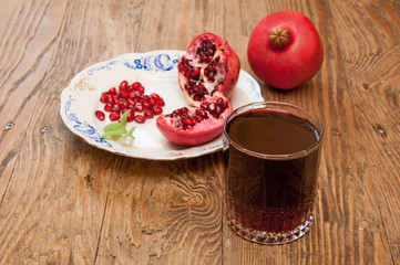 pomegranate on the wooden background