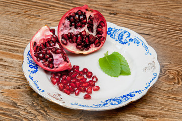 pomegranate on the wooden background