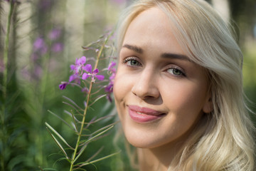 Fototapeta premium Beautiful young woman in stylish hat and jeans shorts posing. Hi