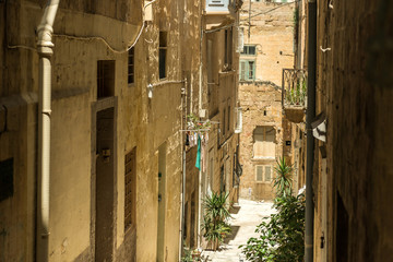 Fototapeta na wymiar Narrow street in Malta