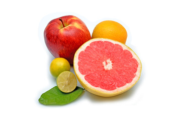 Grapefruit apple and lemon isolated on white.