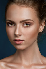 Fototapeta premium Beauty woman face closeup isolated on black background. Beautifu