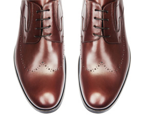 Tip of male shoes isolated on white