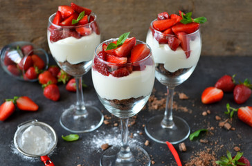 Cheesecake with strawberries in a glass 