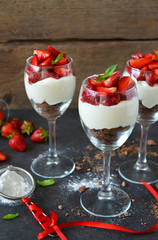 Cheesecake with strawberries in a glass 