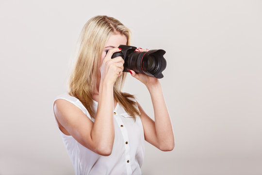Photographer girl shooting images