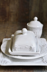 Set of ceramic tableware in white color.