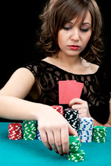 Fototapeta premium Young woman with gambling chips