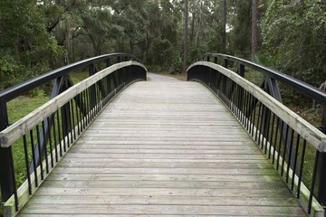 Fototapeta na wymiar View of an old wooden bridge arch