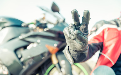 Biker greeting with the fingers