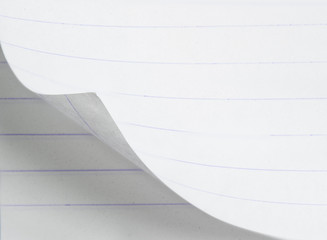 White paper with corner curl with shadow on a blank sheet of pap