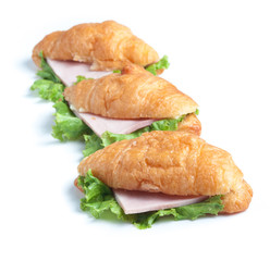 croissant ham cheese on white background
