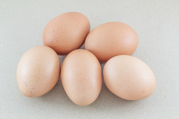 Brown eggs isolated brown  paper background