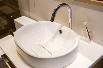 clean water sink and toothbrush