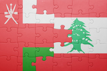 puzzle with the national flag of lebanon and oman