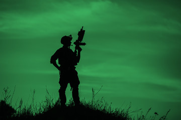 Silhouette of soldier with rifle..